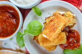 Meatball on top of oversized manicotti filled with four cheeses and topped with homemade and marinara alfredo sauces. Copycat Olive Garden Stuffed Ziti Fritta The Food Hussy