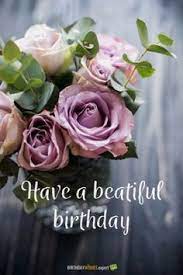 The wonderful colors of pink, blue, and orange look stunning against the dark background. Have A Beautiful Birthday Happybirthdayimages Happy Birthday Flower Birthday Wishes Flowers Birthday Wishes Cards