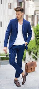 Summer Suiting Inspiration With A Blue Suit White V Neck T Shirt No Show Socks Brown Shoes Aviators Brown Leathe Mens Outfits Business Travel Outfits Blue Suit