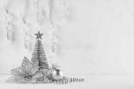 Elegant merry christmas and new year card with golden christmas objects icons. Christmas Glitter Silvery Tree And Poinsettia On White Modern Background Stock Image Image Of Curl Cover 105151967