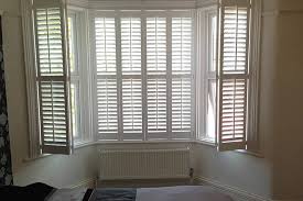 The area required shutters for a bay window and also door area which led out to the courtyard. Dressing Bay Windows With Shutters About Diamond Shutters Shutters London Shutters Kent