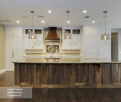 Check spelling or type a new query. White Cabinets With A Walnut Kitchen Island Masterbrand