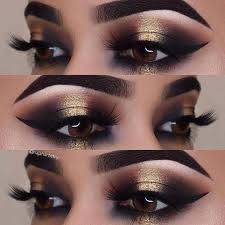 Black And Gold Smokey Eye Makeup Black And Gold Smokey Eye Idea For Brown Eyes Makeup Makeuplooksforbrowneyes Gold Eye Makeup Eye Makeup New Years Eve Makeup