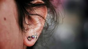 Have A Pierced Ear Infection Here S How To Treat It At Home Infected Ear Piercing Earring Hole Fake Earrings
