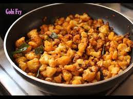 It was usually brought out to the table in a miniature wok with a candle underneath it to keep it warm and to crisp up the cauliflower as it sat on the table. Cauliflower Fry Recipe Gobi Stir Fry Dry How To Make Gobi Fry Cauliflower Stir Fry Youtube