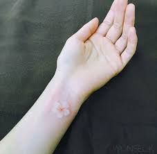 Image result for 4 flower bouquet wrist tattoo. 26 Floral Tattoos That Will Make You Swoon Shesaid