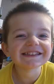 Hello, I'm new here and wanted to share a photo of my adorable grandson  with his bright smile