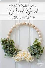 Make Your Own Wood Bead Floral Wreath Diy Floral Wreath Wood Beads Diy Diy Crafts For Adults