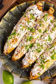 Street corn has been a super popular recipe now for years with good in a small bowl, whisk together the sour cream, miracle whip, lime juice, and remaining garlic, chili powder. Mexican Corn Amanda S Cookin Vegetables