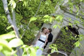 Wedding photographers love to capture a subtle glance at the camera. Wedding Studio Pro Bloomingdale Wedding Photographer