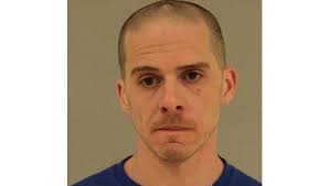 Homicide suspect hit by cruiser