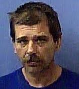 Truck driver in logs wreck charged, held