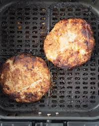 Cooked Air Fryer Turkey Burgers In Air Fryer Basket Cooking Turkey Burgers Air Fryer Dinner Recipes Turkey Burgers