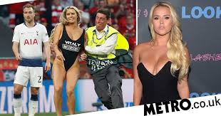 Play had to be temporarily stopped in madrid as the scantily clad model vaulted the advertising boards and made her way across the pitch. Champions League Pitch Invader Was Promoting Porn Website