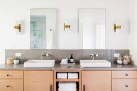 Hang a chandelier for a bit of sophistication in an unexpected spot—like over the tub. 15 Cheap Bathroom Remodel Ideas
