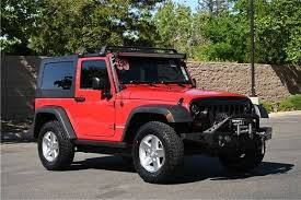 Image result for Flame Red 2009 Jeep