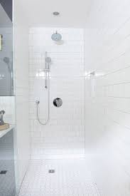 Be consistent with pattern use tiles in different colors and sizes, but keep the shape consistent for a harmonious effect. Brick Pattern Shower Tiles Design Ideas