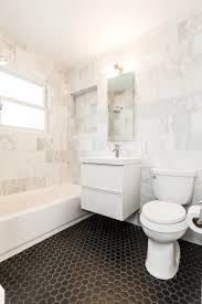 But unless you adorn them properly, a blush sink, toilet and tub admixture creates a… Small Bathroom Large Floor Tile Novocom Top
