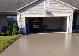 I have a concrete garage floor that is cracking near the apron entry at the overhead door. Holland Concrete Contractor Driveways Patios Pool Decks Decorative