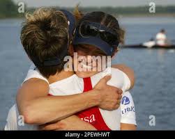 Stacey Borgman, facing camera, of Homer, Ark., and Lisa Schlenker of Lake  Oswego, Ore., representing the Princeton Training Center/New York Athletic  Club, celebrate their a win in the lightweight women's double sculls in  U.S. Olympic Team Trials for ...