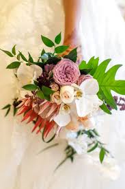 Here you can place your order for bridal bouquets corsages, boutonnieres and alternative decorations and solutions for your wedding and any other celebration! Classic Bouquet With Ranunculus Orchids Garden Roses And King Protea