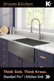 The Farmhouse Sink A Marriage Of Utility And Elegance In 2020 Farmhouse Sink Kitchen Concepts Grey Countertops