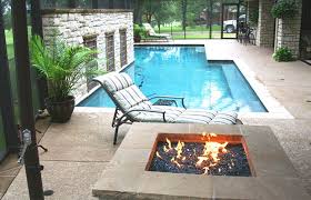 Give your backyard a sophisticated update and a cozy glow with these outdoor fireplace ideas. Why You Need An Outdoor Fireplace Or Fire Pit Fort Worth Magazine