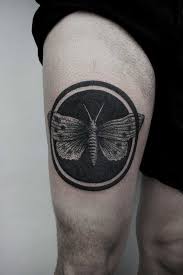 Black Circle And A Moth Tattoo Inked On The Right Thigh By Andrei Svetov Circle Tattoos Moth Tattoo Tasteful Tattoos