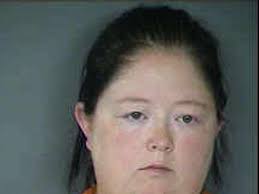 Woman accused of videoing assaults