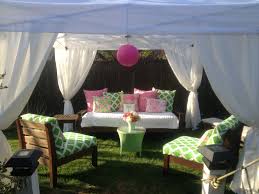 I Added Fabric To Curtains On A Simple Ez Up Tent Re Covered Cushions And Made Pink And Green Pillows Ez Up Tent Tent Decorations Decor
