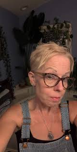 older woman loses 64 pounds and takes up climbing