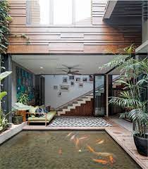 Di depan rumah, dalam ruangan, samping rumah atau mungkin halaman belakang rumah. Buat Rumah Sejuk Ini 12 Inspirasi Desain Kolam Ikan