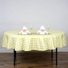 Table covered with checkered tablecloth. 15 Checkered Tablecloths 60 60 Overlays Polyester Gingham Yellow Woven 1 Tablecloths Patterer Home Garden