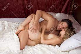 Young Sexy Naked Heterosexual Couple Making Love In Bed Stock Photo, Picture  and Royalty Free Image. Image 21896227.