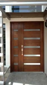 Desain pintu rumah dengan tinggi mencapai 17 meter dan lebar 5,5 m ini terdiri dari 40 bagian kayu solid jati burma. 65 Jenis Pintu Rumah Yang Sangat Wow Dan Menyebabkan Rumah Anda Merecik Cantik Hartatanah Com