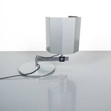 First you would have dim lighting as voltage drops would occur across each lighting fixture, 2nd as in the old style christmas tree lighting one light that burns out all go will go out, 3rd it would be a major code violation. Bauhaus Desk Light By Carl J Jucker Germany 1923 Derive