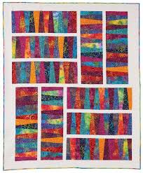 An Assortment Of Bright Colored Batiks And The Fons Amp Porter Large Wedge Template Create This Bed Size Quilt Patterns Quilt Pattern Download Bright Quilts
