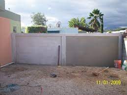 After washing the exterior walls, give them a good amount of time to dry before painting. Sun Shade Pergola Patio Concrete Block Walls Pergola Patio Pergola Shade