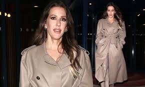 Ellie Goulding looks chic in a leather look trench coat as she leads  arrivals at the Sony party | Daily Mail Online