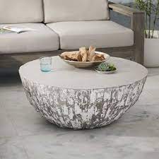 Not only is it a large, functional coffee table, but the geometric design adds some artistic flair to the piece. Sculpted Concrete Drum Coffee Table Drum Coffee Table Coffee Table Wood Marble Top Coffee Table