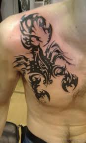 Tribal scorpion tattoo on man chest. 60 Mind Blowing Scorpion Tattoos Designs On Chest