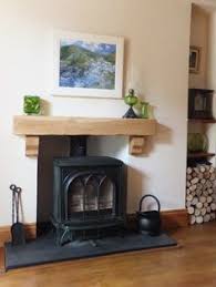 We Have An Electric Wood Burner Stove Like The Idea Of Having A Rustic Beam Above To Use As A Shelf With A Mirror Ov Living Room Mantle Home Home