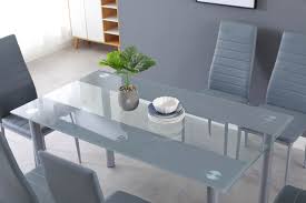 The synthetic leather is soft to the touch while its curved seating provides comfort. Stunning Grey Glass Dining Table Set With 4 Or 6 Grey Faux Leather Chairs Cosy Home