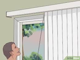 To fix vertical blinds that won't rotate, start by adjusting each blind individually and removing any items that may be jamming them. 3 Ways To Repair Vertical Blinds Wikihow