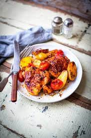 Harissa Chicken With Potatoes Tomatoes Thyme Harissa Chicken Delicious Dinner Recipes Chicken Potatoes