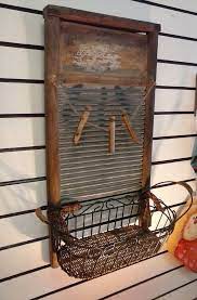 This metal birds door crawler wall décor is a unique way to add some whimsy to an otherwise underused space. Free Shipping Primitive Wall Decor Metal Wood Washboard Decorated With A Clothes Line Old Clothes Pins Bedroom Living Room Bathroom Decor Primitive Laundry Rooms Washboard Decor Primitive Decorating