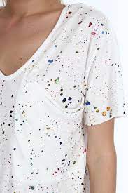 Printed graphic in black at chest. Minusey Acrylic Paint Splatter Tee Ilham