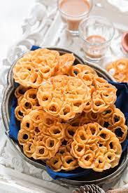 Rose Cookies Aka Achu Murukku Is A Traditional South Indian Snack Made During Festivals In India The Pretty Rose Cookies Indian Dessert Recipes Indian Snacks