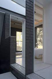 Mayor bowser has 'black lives matter' painted on street leading to white house. Award Winning Small House In London With A Dark Brick Exterior