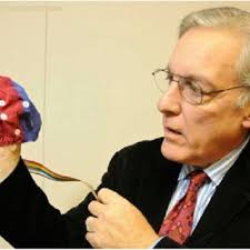 Dr. AU36 c Marvin Berman with QEEG Cap. Images of brain PBM and QEEG...